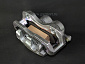 суппорт Газель NEXT передний (без колодок) левый (TRACKMAN)